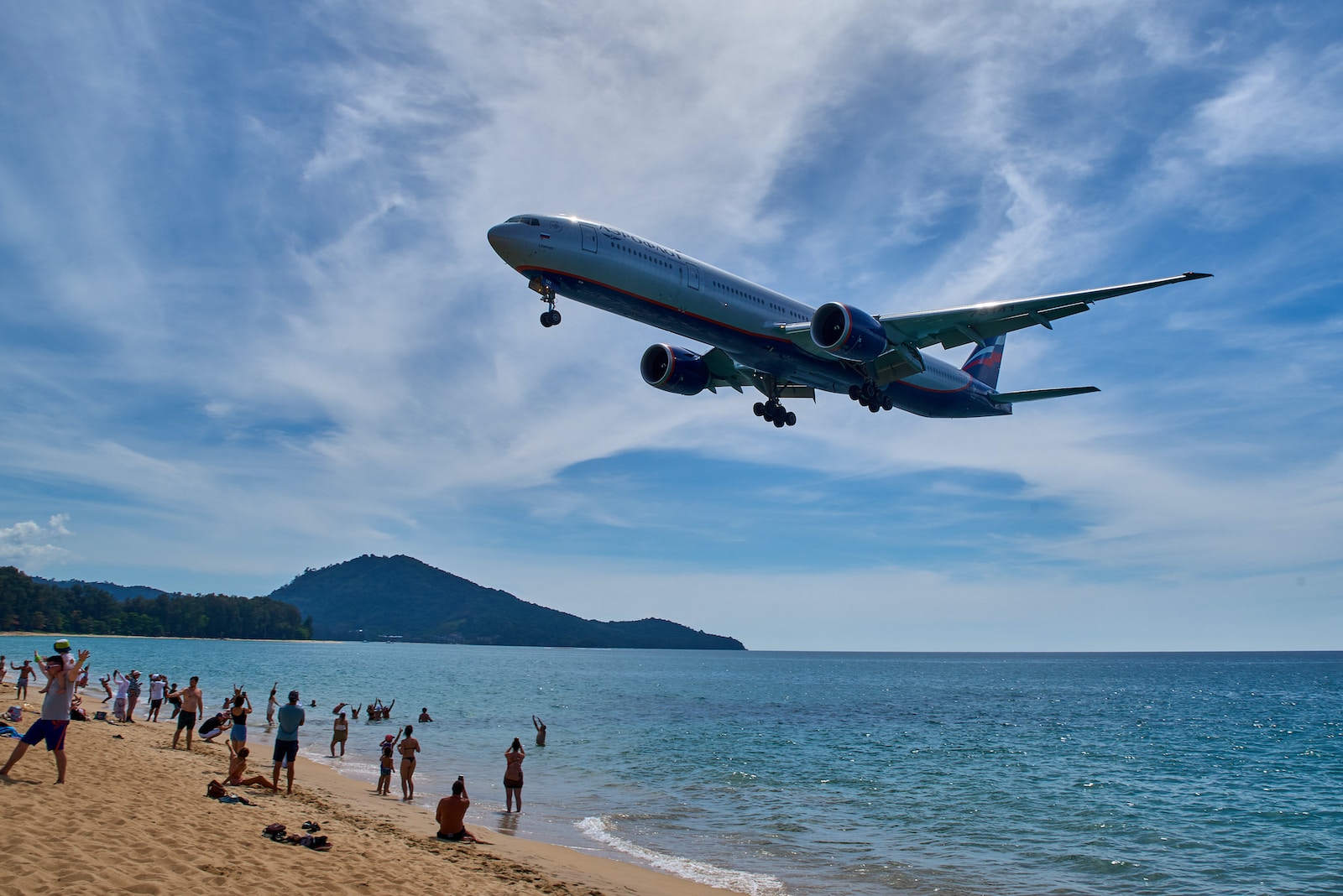 A tourist attraction - on Phuket the large passenger planes land just a few meters above the beach.