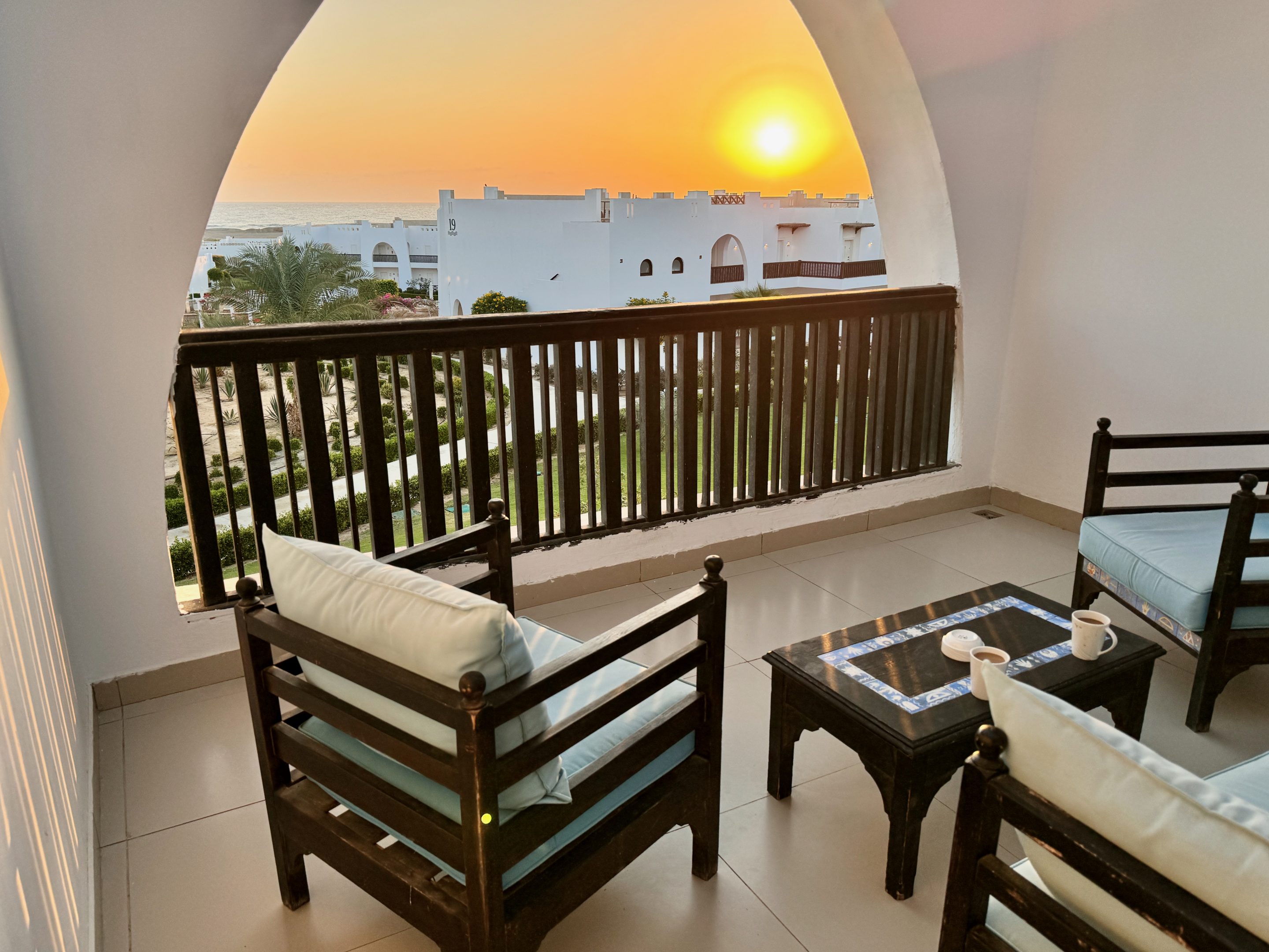 Sunrise on the balcony with a coffee – the perfect start to the day at the Hilton Marsa Alam. Photo: Sascha Tegtmeyer Hilton Marsa Alam Nubian Resort Experiences Reviews